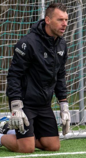 Actiefoto op knieën